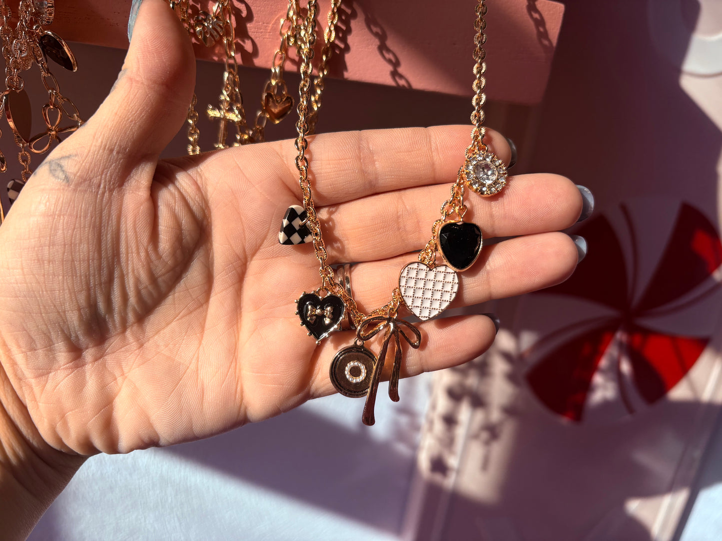 Mythic Checkered bow charm necklace